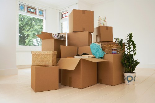 Professional movers handling boxes in Clapham