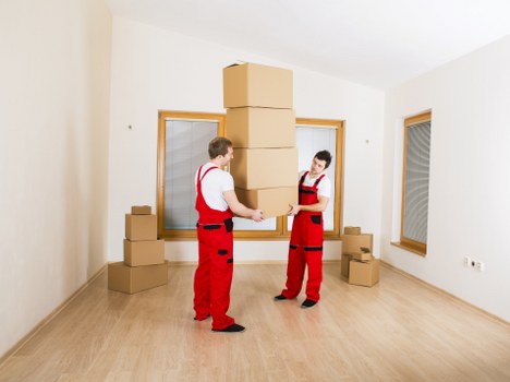 Experienced movers in Clapham handling furniture